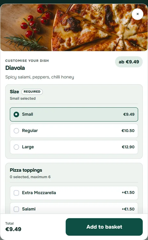 Ordering page of the OrderKick demo pizzeria on a phone: Pizza Diavola with sizes and extras to choose from